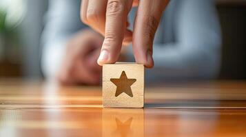 A person is placing a wooden block with a star on it photo
