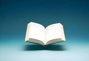 open book with crisp white blank pages in v-shape floating on soft gradient blue background with light tan cover photo