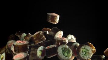 Traditional Japanese rolls with vegetables and fish. Filmed on a high-speed camera at 1000 fps. High quality FullHD footage video