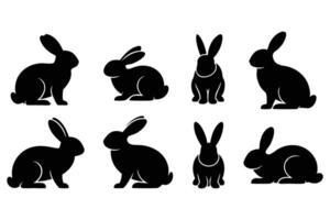 Diverse Rabbit Silhouettes in Black, Showing Different Poses of Sitting, Hopping, and Running vector