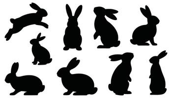 Various Rabbit Silhouettes in Black, Showing Different Poses Including Hopping, Sitting, and Walking vector
