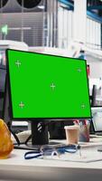 Vertical Black technician in photovoltaics factory reviews system on mockup pc, inspecting program to identify errors. Photovoltaic plant worker adjusting manufacturing parameters on monitor. Camera B. video