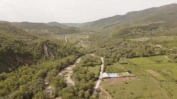 Aerial panorama highway road Luxury Villa in Kakheti Region Tranquil Retreat for Travel and Relaxation in the Heart of the Caucasus Mountains.Efficient Space Planning Functional Architecture video