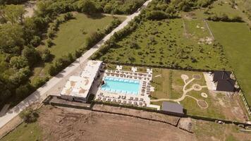 Aerial panorama highway road and Luxury Villa in Kakheti Region. Tranquil Retreat for Travel and Relaxation in the Heart of Caucasus Mountains.Efficient Space Planning. Functional Architecture video