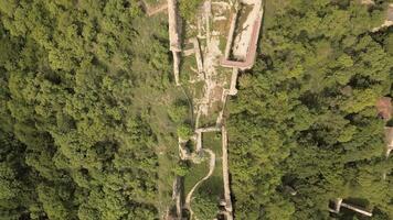 Aerial top down fly over view Ujarma Fortress ruins. Ancient Hilltop Royal Citadel and Strategic Stronghold of the Iberian Kings in Kakheti, Georgia. Sightseeing destination in Kakheti wine region video