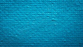 blue paint on canvas with visible texture photo