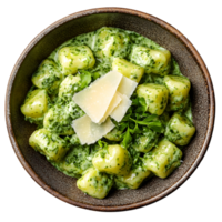 Overhead View of Creamy Green Gnocchi Pasta Dish with Parmesan Cheese and Herbs on a Brown Bowl Isolated Against Transparent Background png
