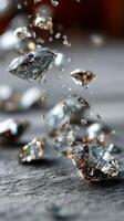 Sparkling diamonds suspended in mid-air with a blurred background. High end jewelry and diamond. photo