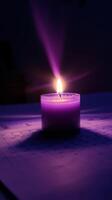Violet Candle Light Reflecting on Dates photo