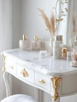 Luxurious Vintage Inspired Vanity with Marble and Gold Features photo