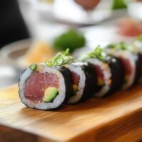 Serving Board Featuring Neatly Aligned Tuna Maki Rolls photo