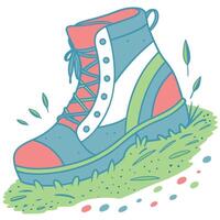 A colorful hiking boot stands on a patch of green grass with small leaves around it vector