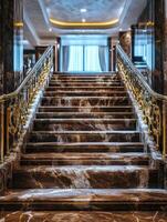 Sophisticated Marble Staircase Enhanced by Brass Trim photo