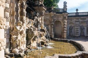 Dresden, Germany - august 16, 2022-view of the vast Zwinger complex, one of the most important baroque monuments in the city, during a sunny day photo