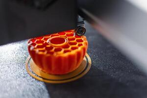 3d printer printing an object on the tray with pla filament, corn starch, non-waterproof filament, technology photo