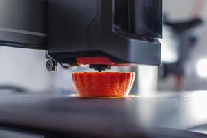 3d printer printing an object on the tray with pla filament, corn starch, non-waterproof filament, showcase photo