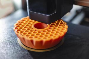 3d printer printing an object on the tray with pla filament, corn starch, non-waterproof filament, plastic photo
