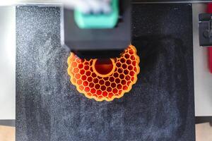 3d printer printing an object on the tray with pla filament, corn starch, non-waterproof filament, business photo
