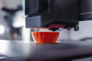 3d printer printing an object on the tray with pla filament, corn starch, non-waterproof filament, home photo