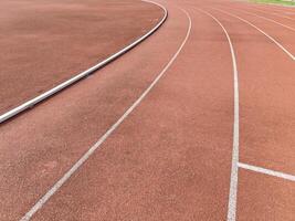 Multi-Function Stadium Running Track with Football Field and Athletic Running Track photo