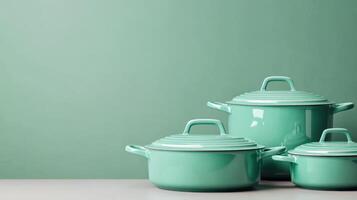 Stylish turquoise cookware set displayed on a subtle background for modern kitchen decor inspiration photo