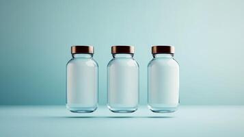 Three clear glass jars with wooden lids arranged symmetrically on a light blue surface photo