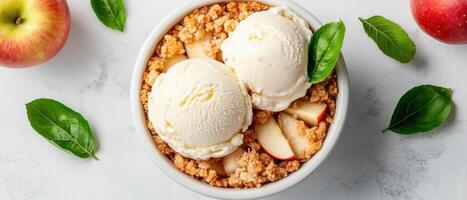 Warm apple crumble with ice cream scoops in bowl. Fresh dessert with fruits and crumble topping. Vegetarian treat with baked apples. photo