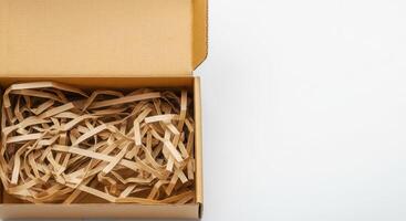 Cardboard box with paper shred fill for eco-friendly packaging solutions photo