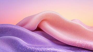 Wavy shiny fabric texture. Pink and purple textile surface. Soft smooth material with glitter. Elegant background with flowing folds. photo