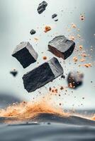 Dark stones falling. Brown particles exploding. Isolated mineral pieces airborne. Rough rocks levitating against gray backdrop. Pieces suspended in gravity. Ground erosion and geology theme. photo