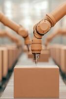 Automated arms work above boxes. Orange robotic arms moving above cardboard on a conveyor belt in a warehouse. Factory packing boxes with modern machinery. photo