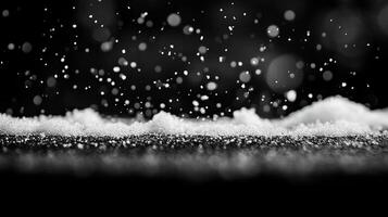 Close-Up of Snowflakes Falling on Black Surface. Winter Scene with Bokeh Effect photo