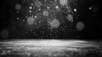 Snowfall Particles Falling on Dark Surface with Bokeh Effect photo