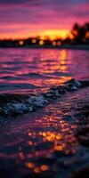 Sunset hues reflecting on calm water surface in evening photo