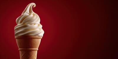 An ice cream cone with whipped cream on a red background photo