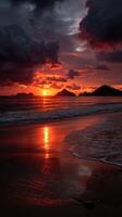Breathtaking sunset over tranquil beach with gentle waves photo