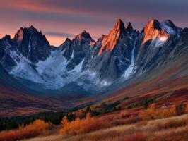 Majestic mountain peaks glowing at sunset in autumn landscape photo
