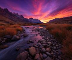 Stunning sunset over the river and mountains in Patagonia photo
