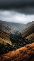 Vast green valleys beneath a cloudy sky in the mountains photo