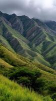Beautiful green mountains under a cloudy sky in nature photo