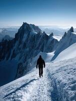Winter hike on a snow-covered mountain path at dawn photo