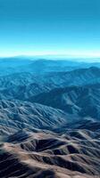 Majestic mountain range viewed from above on a clear day photo