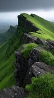 Breathtaking view of green mountain cliffs under a cloudy sky photo