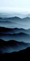 Stunning layers of blue mountains under soft morning light photo