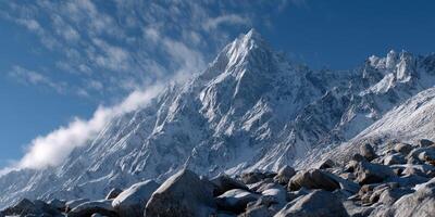 A mountain with rocks and snow on top photo