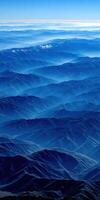 Breathtaking mountain range under a clear blue sky photo