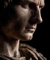 Detailed bust of a stoic figure carved from stone, highlighting ancient artistry photo