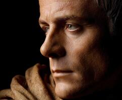 Stoic figure with focused expression and intricate details highlighting wisdom photo