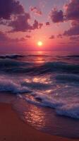 Serene sunset over the ocean creates a tranquil beach atmosphere photo