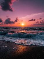 Sunset over the ocean with rolling waves at a serene beach location photo